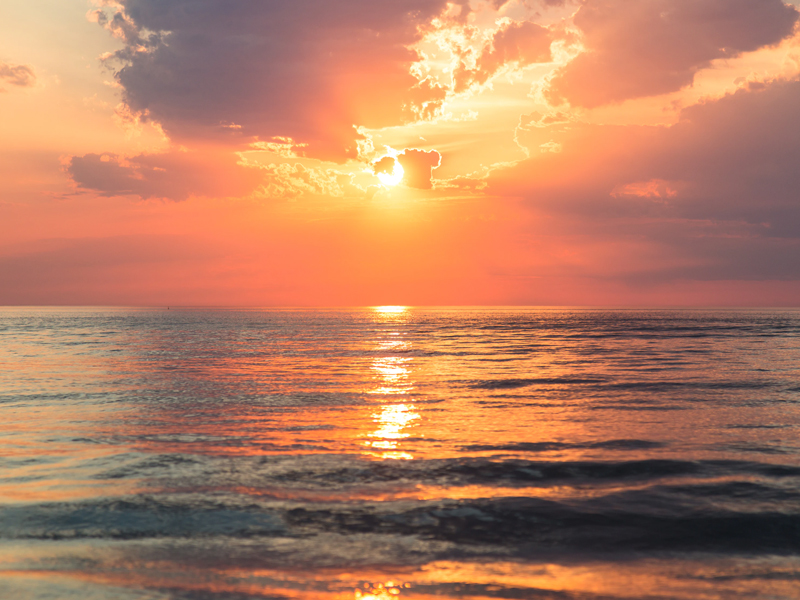 Sunset Over The Sea
